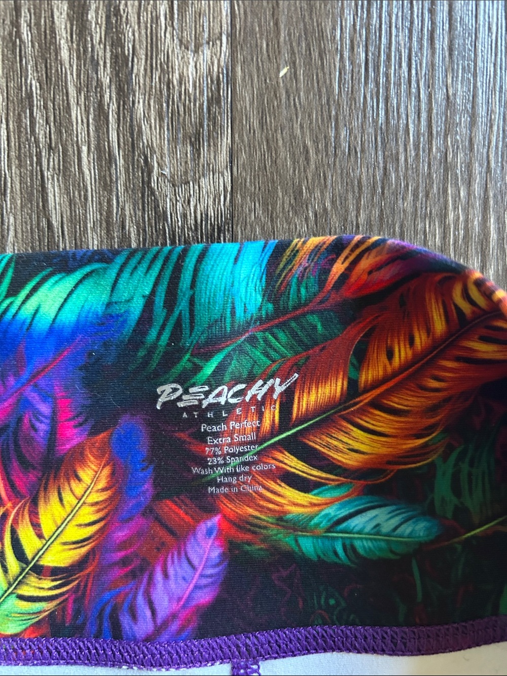 Peachy Women’s Multicolor Feather Print Performance Shorts - Picture 2 of 4